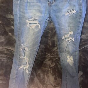 Blue ripped skinny jeans